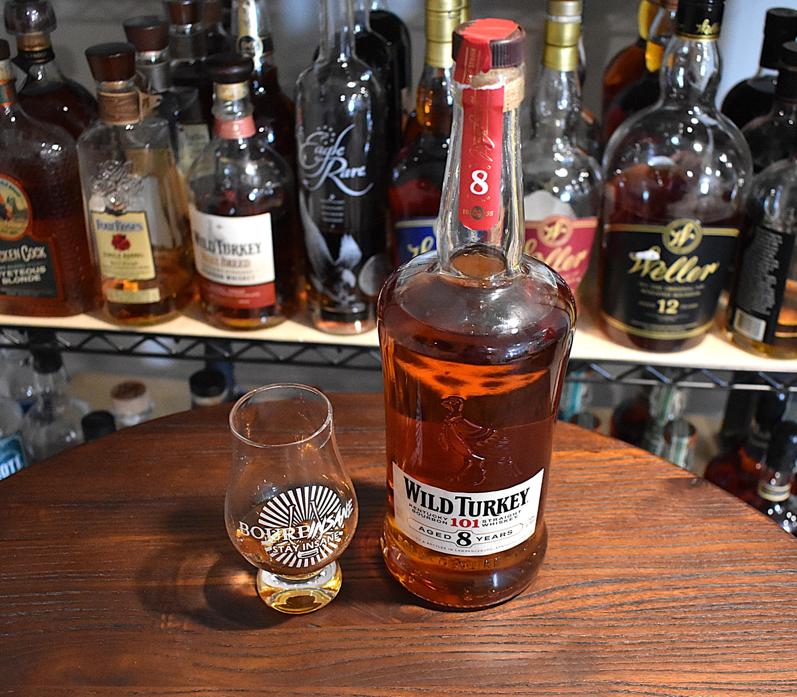 Wild Turkey 8 Year 101 Bourbon Bottle with Bourbinsane glencairn next to it